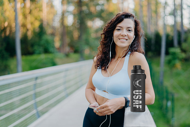 A matte black stainless steel water bottle with 'USAF' and an Air Force wings emblem in silver.