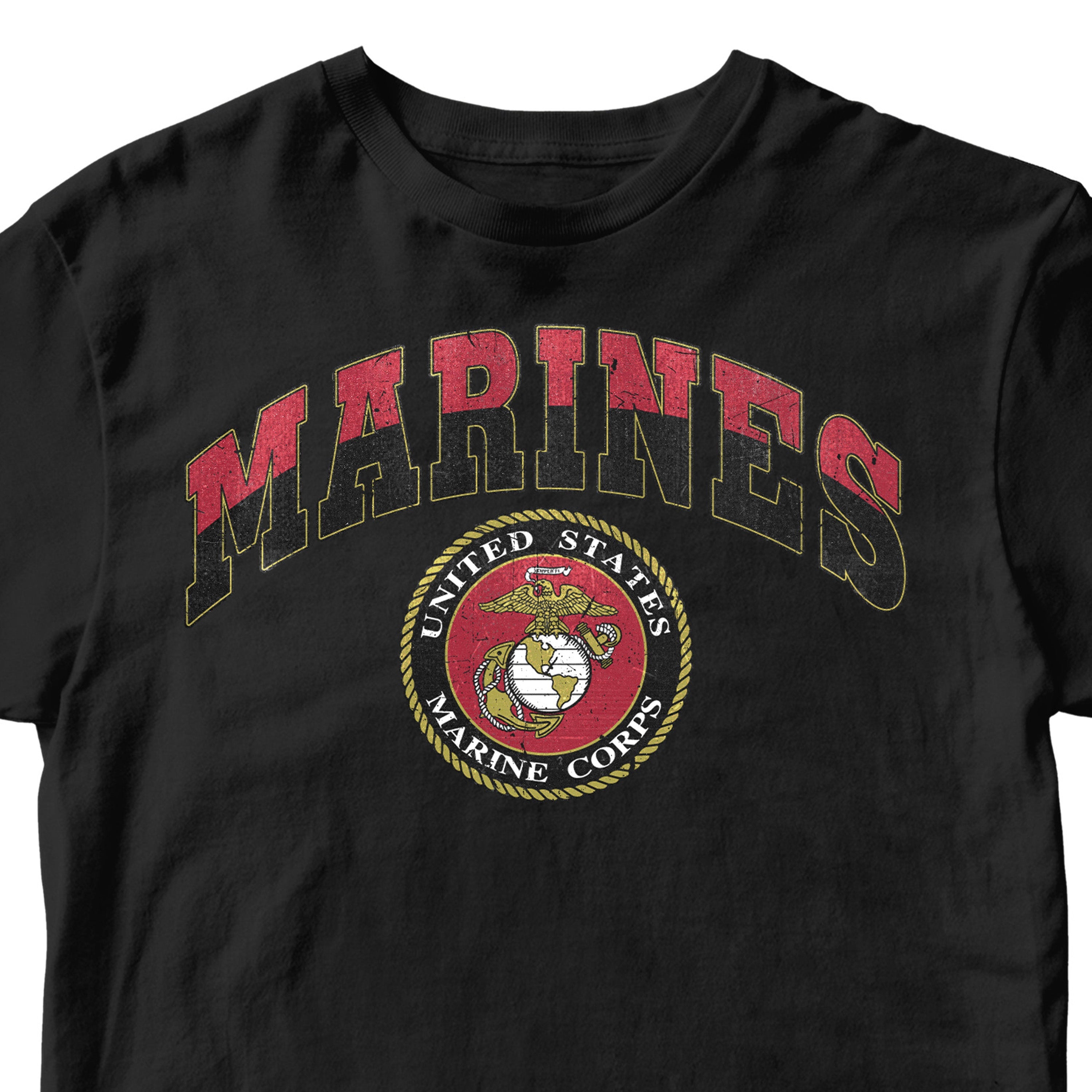 Vintage USMC Marines t-shirt with distressed red and black 'MARINES' text and full-color United States Marine Corps seal on chest, patriotic military shirt for veterans and Marine supporters