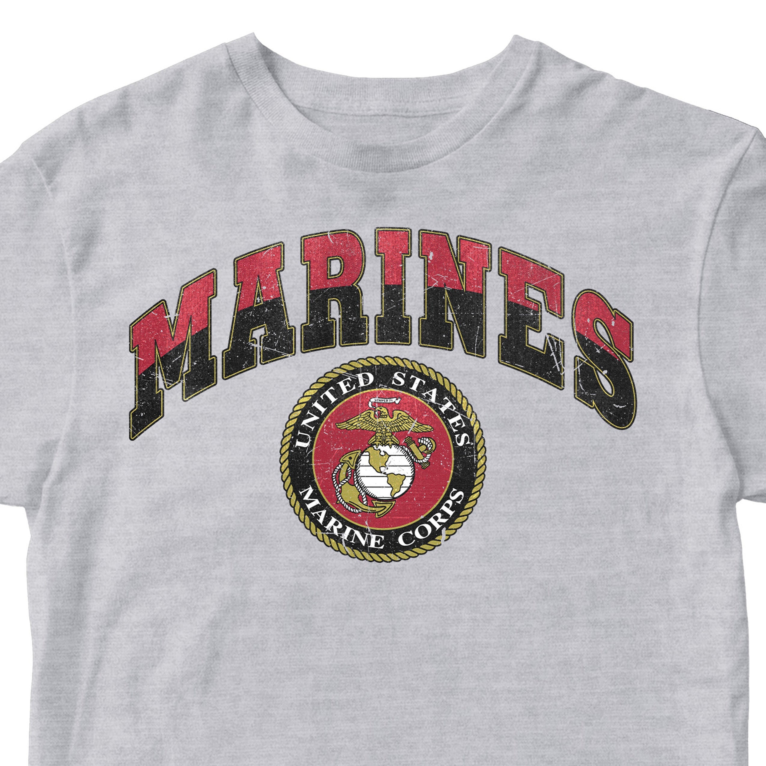 Vintage USMC Marines t-shirt with distressed red and black 'MARINES' text and full-color United States Marine Corps seal on chest, patriotic military shirt for veterans and Marine supporters