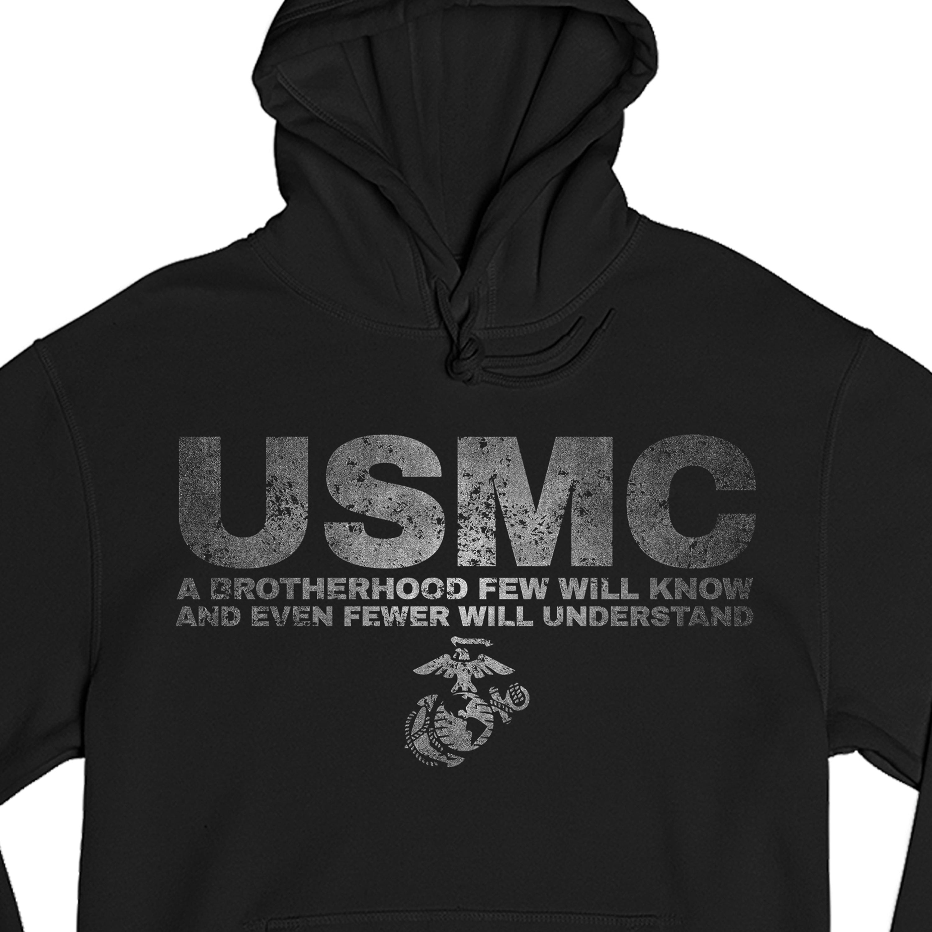 USMC black hoodie with large distressed gray 'USMC' text and quote 'A Brotherhood Few Will Know and Even Fewer Will Understand' above the Eagle, Globe, and Anchor emblem on chest