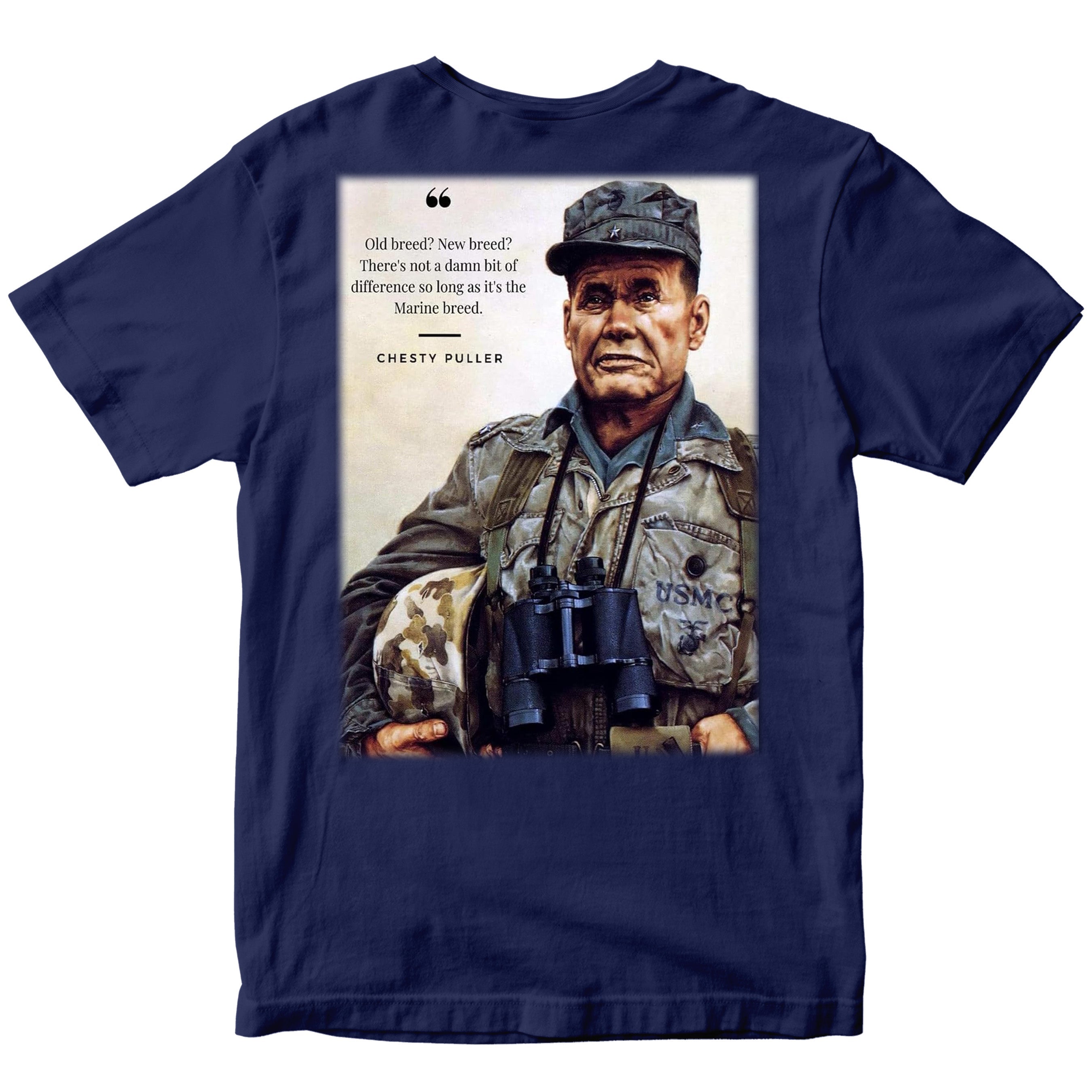 Marines navy T‑shirt showing a color portrait of Lt. Gen. Chesty Puller holding a helmet and binoculars, with the quote ‘Old breed? New breed? There’s not a damn bit of difference so long as it’s the Marine breed.’ and ‘Chesty Puller’ below.”
