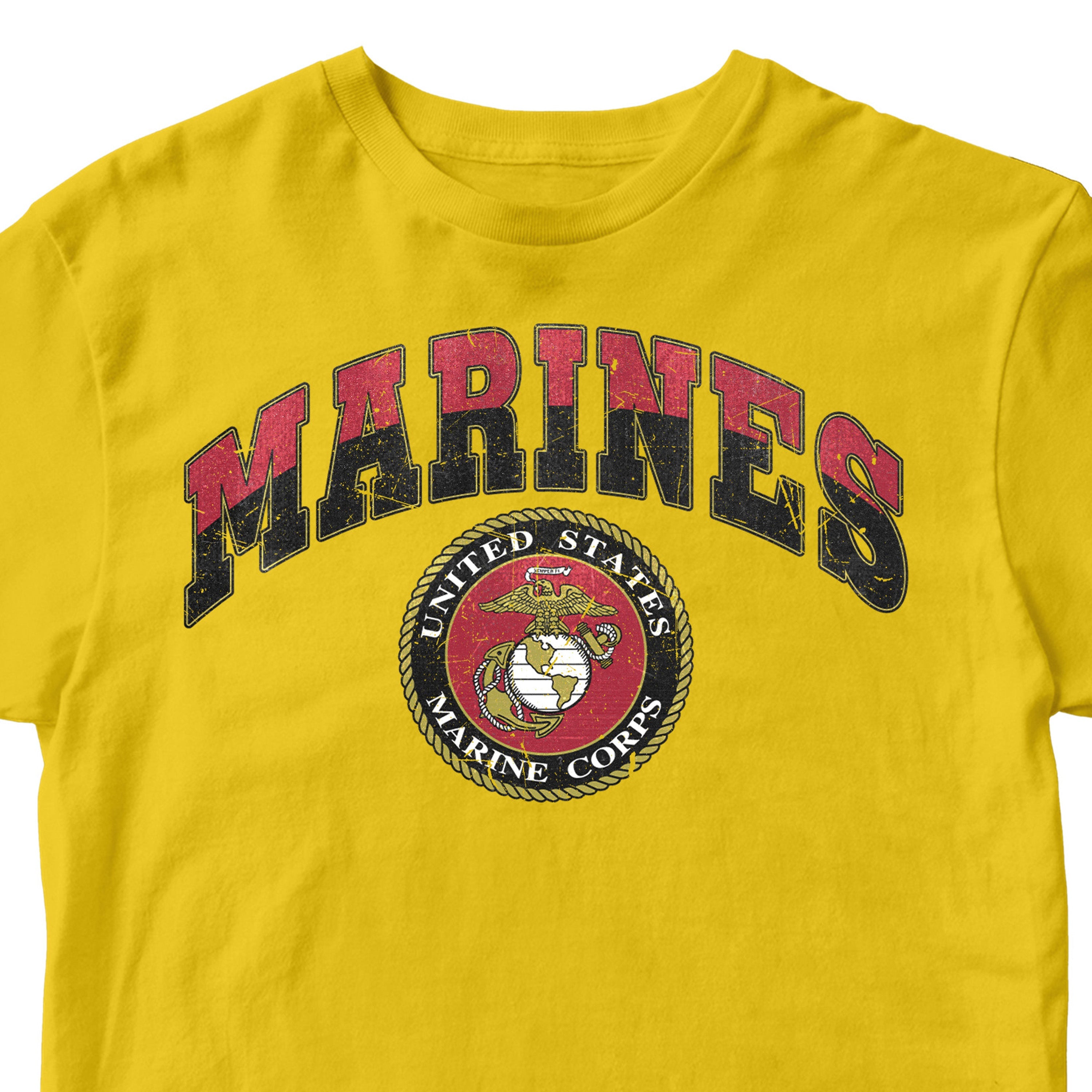 Vintage USMC Marines t-shirt with distressed red and black 'MARINES' text and full-color United States Marine Corps seal on chest, patriotic military shirt for veterans and Marine supporters